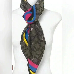 TOUS Logogram collection scarf in black, with TOUS logo print babushka hijab